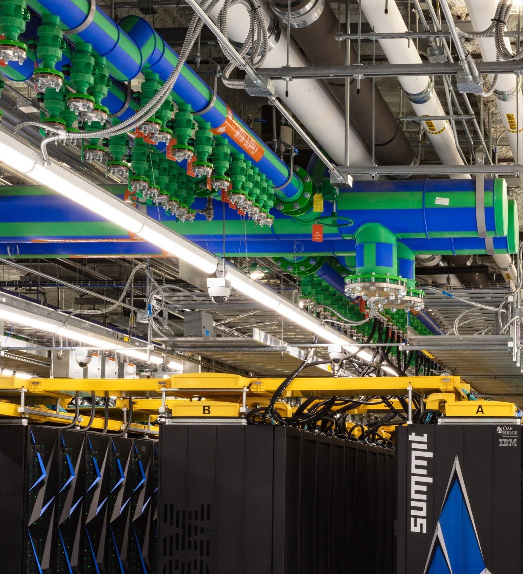 liquid cooling and overhead power distribution for the Summit high performance compute cluster